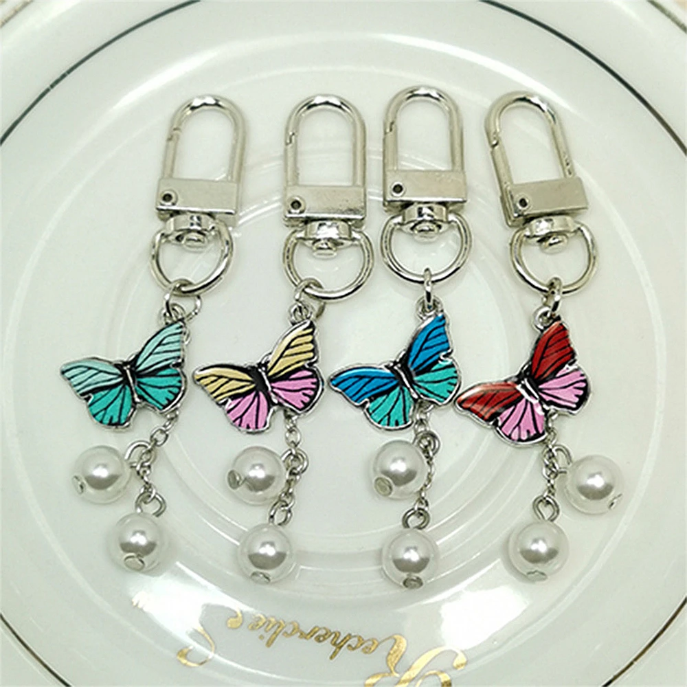 

Vintage Enamel Butterfly Keychain With Pearl Cute Charm Insect Silver Plated Car Bag Cell Phone Key Rings For Women Party Favors