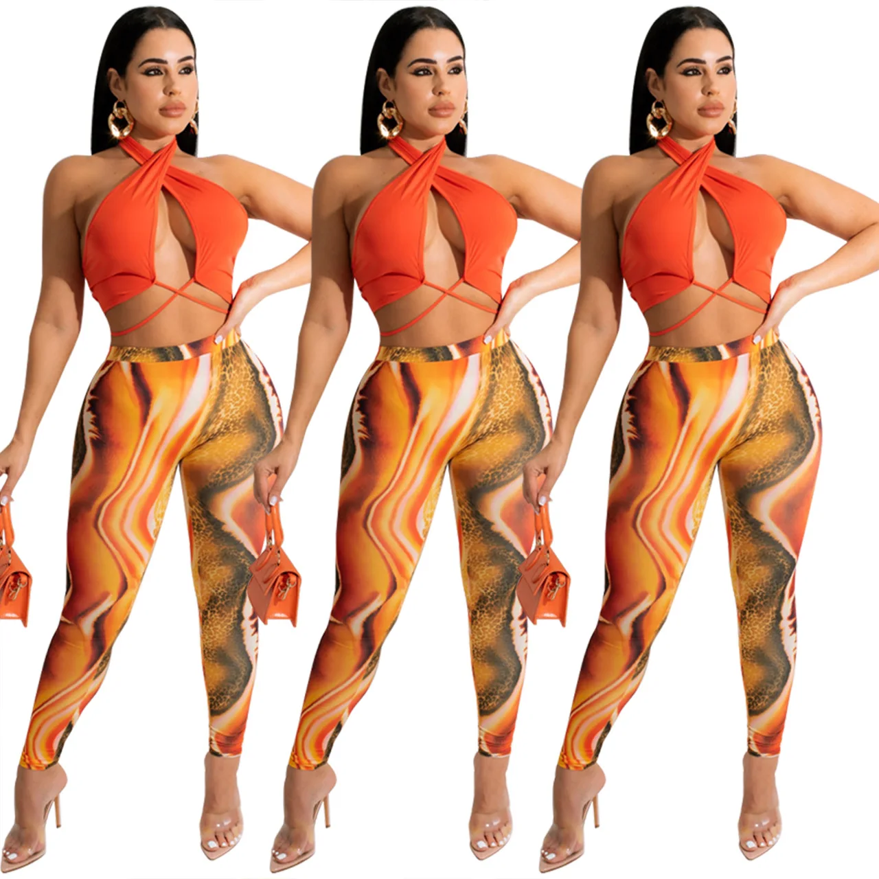 

Women Sexy Halter Solid Color Top + Printed Pencil Pants Two-piece Set Spring 2022
