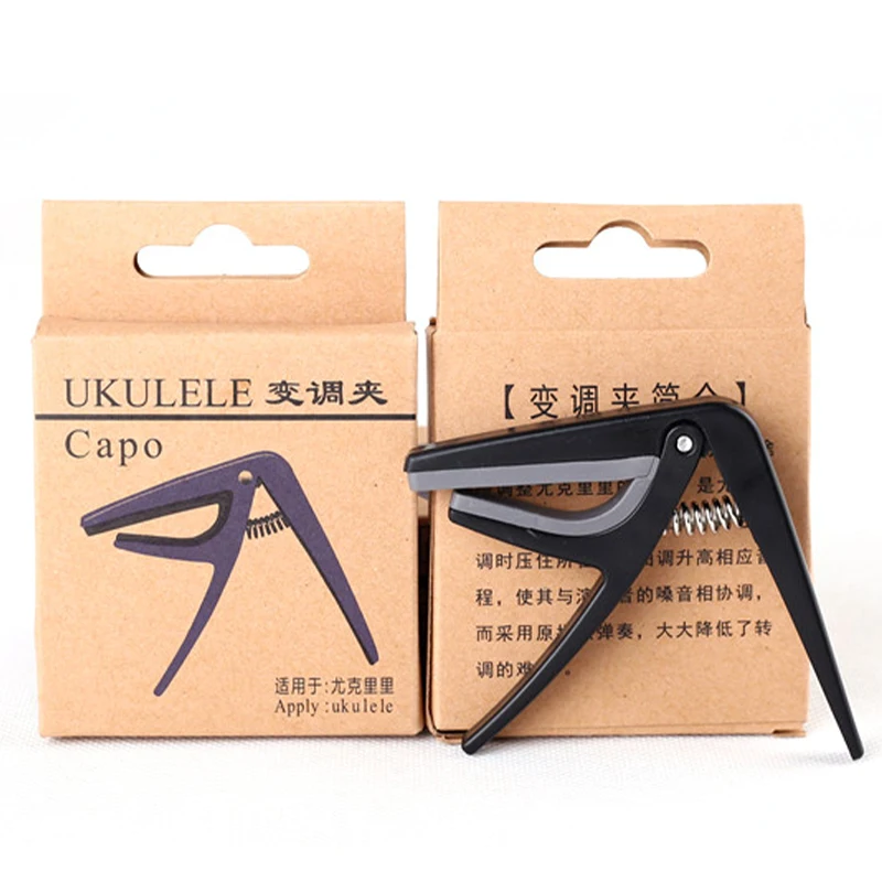 

Professional Ukulele Capo 4 Strings Hawaii Guitar Capo Single-handed Quick Change Ukelele Capo Guitar Tuner Guitar Accessories