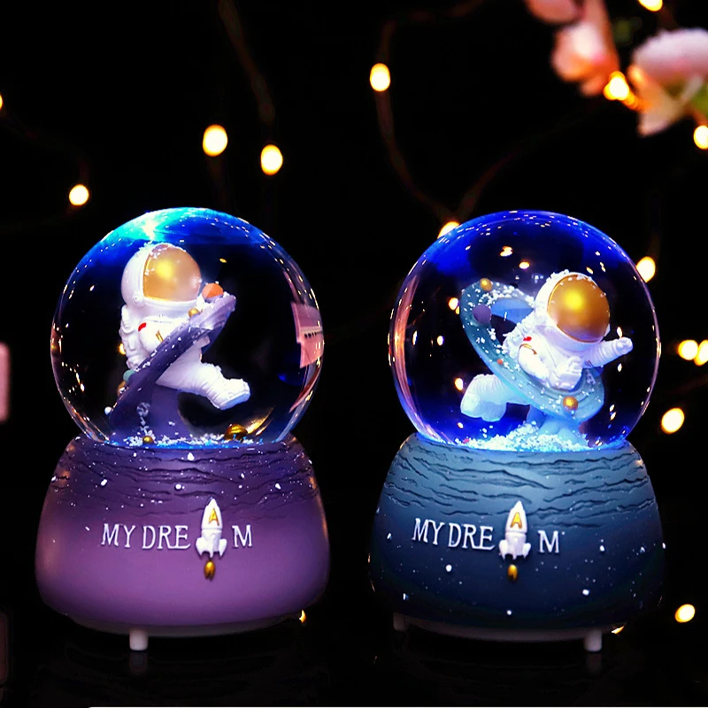 

Different time space astronaut astronaut crystal ball music box snow luminous music box desktop decoration gift ornaments