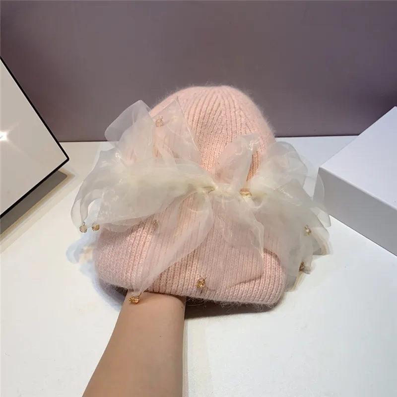 

202212-shi dropshipping winter soft Angora rabbit warm Elegant organza Crystal pendant lady Skullies Beanies cap women cool hat