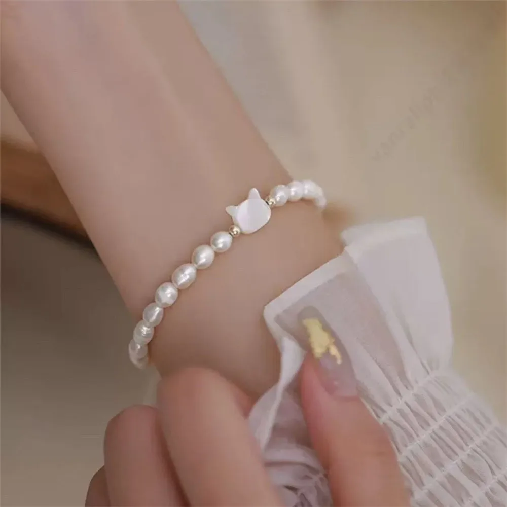 

Cat bracelet 4-5MM natural high quality freshwater rice pearls Natural shells