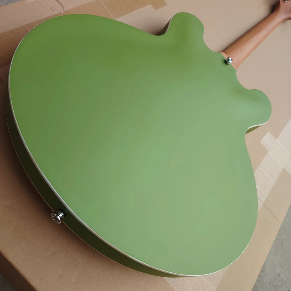 Флюоресцентная электрическая гитара с коричневыми круглыми краями и