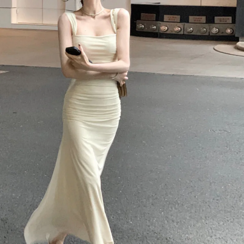 

A Sexy Strap Dress 2024 Early Spring Temperament Feminine Irregular Square Collar Waist Solid Color Trupnet Dresses Female