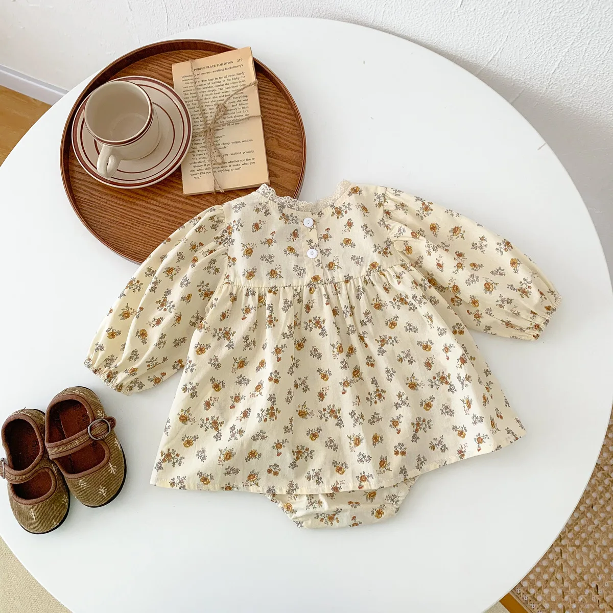 

Floral Full Sleeve Infant Romper