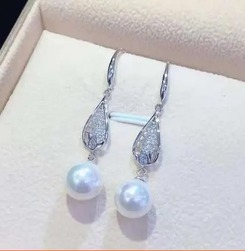 

Серьги из серебра 925 пробы с цирконом и жемчугом