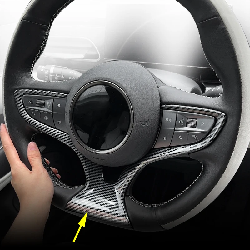 Фото Накладки из АБС-пластика под карбон для BYD Seal EV 2023-2026: накладки на дефлекторы кондиционера, руль, зеркала заднего вида, подлокотник, панель, дверные ручки №5