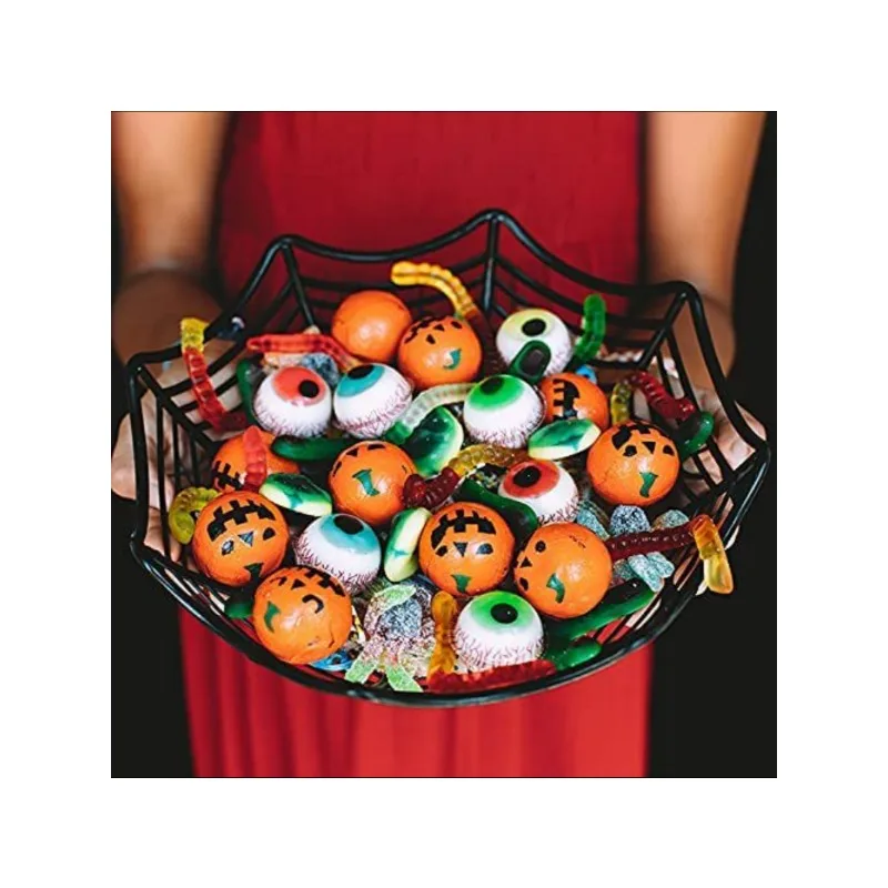 Собирают ли конфеты на хэллоуин. Тыква со сладостями. Вкусняшки на хэллоуин. Хэллоуинские сладости конфеты. Хэллоуинские конфеты.