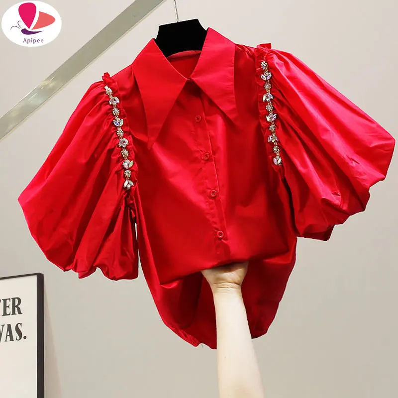 

APIPEE 2023 New Autumn Summer Fashion Puff Sleeve Diamond Inlaid Chain Decoration Irregular Single Breasted Shirt Top
