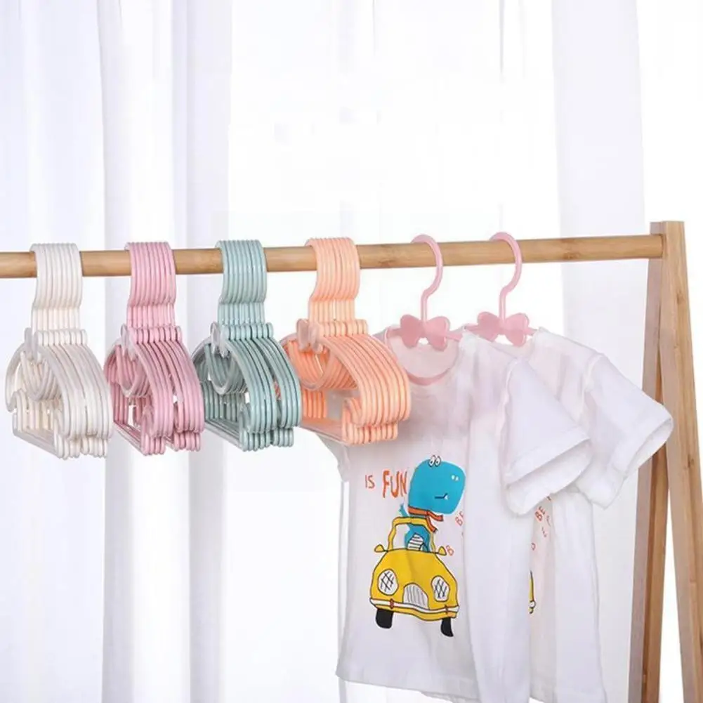 

Ildren's Bow Hanger Home Baby Clothes Hanger Plastic Portable Cute Clothes Hanger Non-slip Hook Design Hanger For Baby L8k7