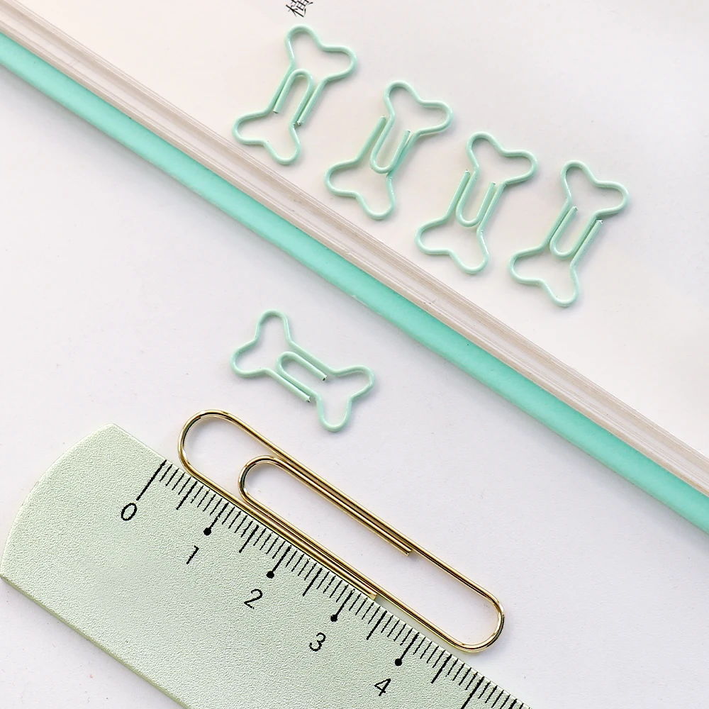 

Металлические зажимы для книг 50 шт.