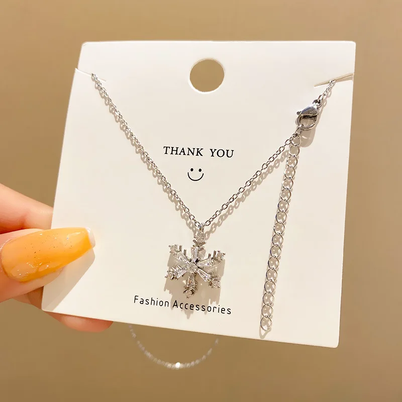 

New 2022 Unique Design Snowflake Rotatable Titanium Steel Necklace
