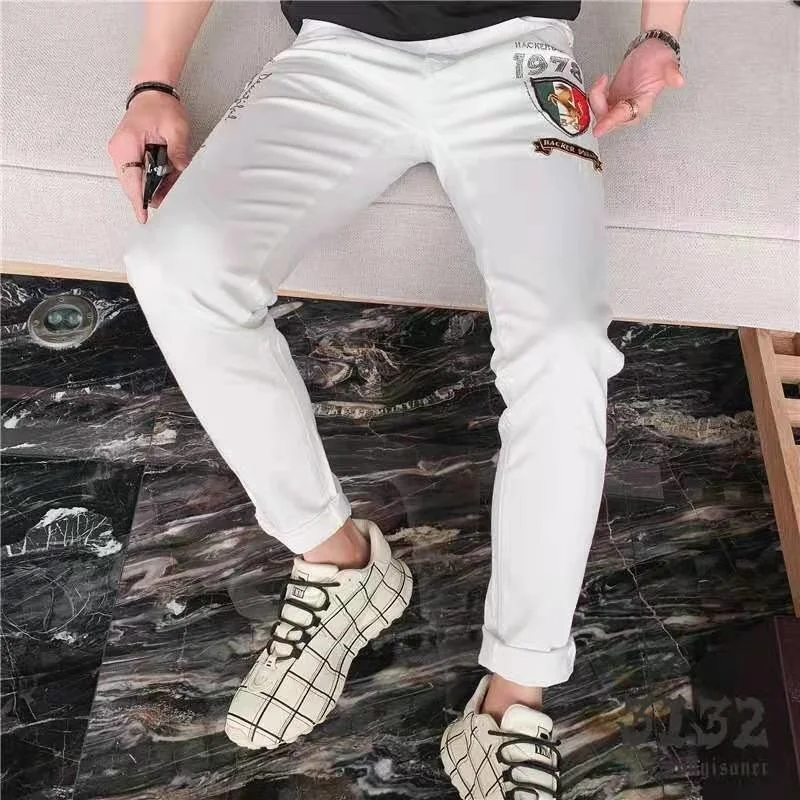 Джинсы мужские облегающие эластичные с вышивкой и надписью