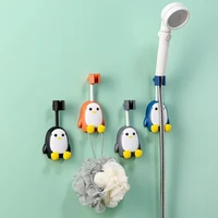 360%c2%b0 adjustable shower head holder cute penguin wall mounted showerhead bracket self adhesive shower rail head holder with hooks