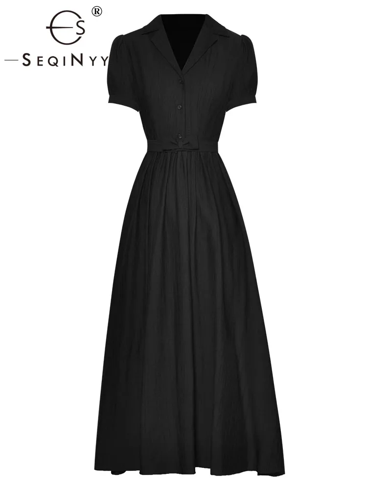 

Женское платье-миди с коротким рукавом, карманами и трапециевидным силуэтом