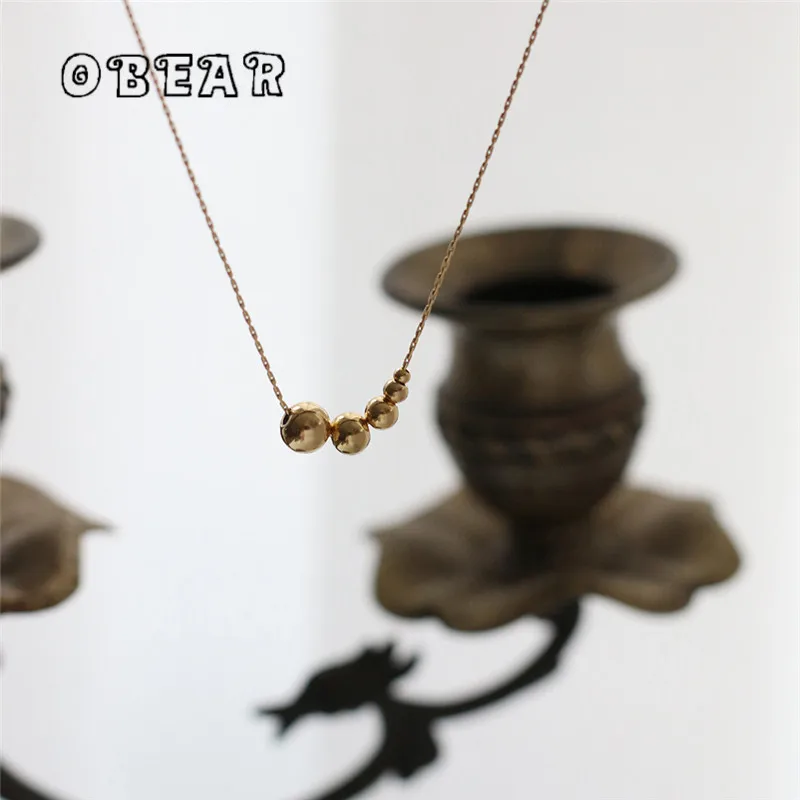 

Stainless Steel Plated 18K Gold Gradient Gold Bead Necklace Clavicle Chain for Women Creative Personality Party Jewelry