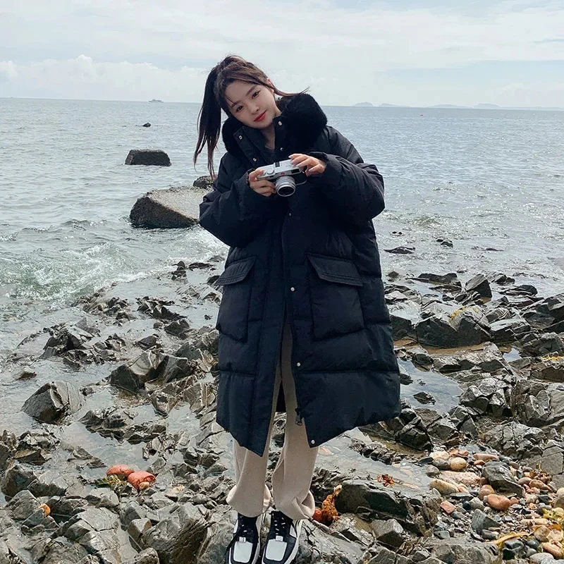 Женская длинная стеганая куртка с меховым воротником и капюшоном теплая зимняя