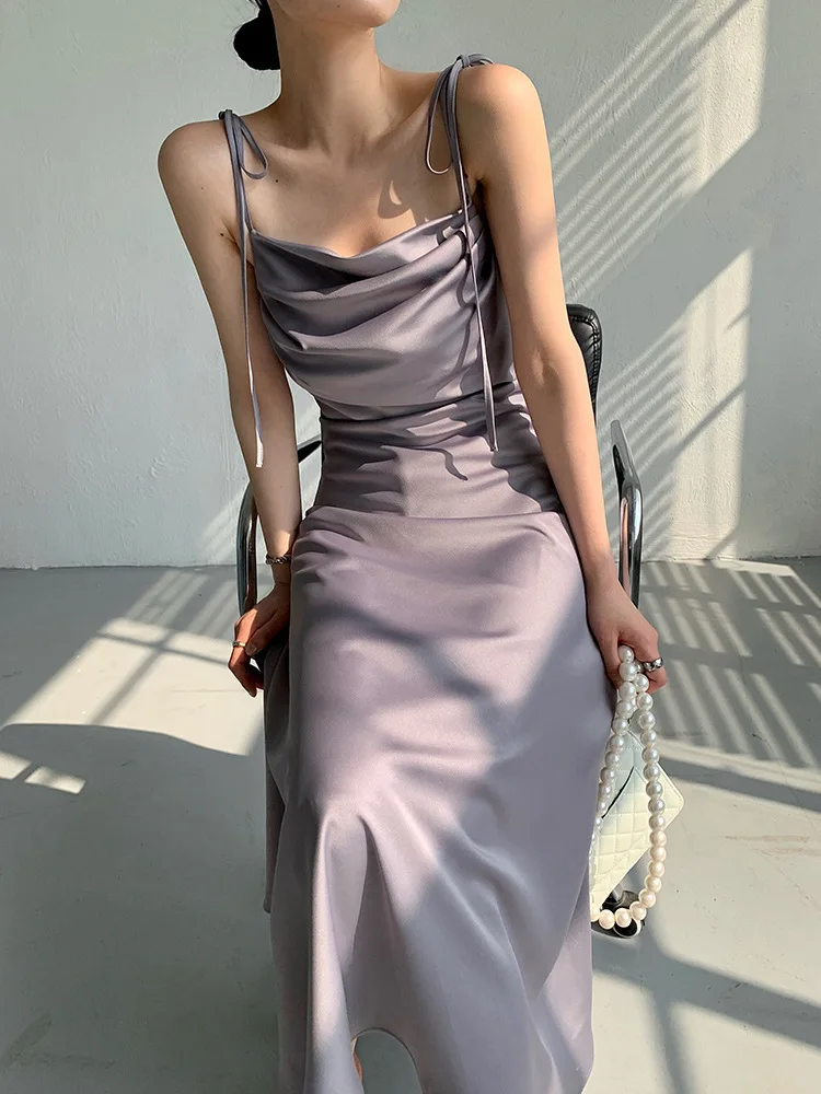 

2022 Summer New French Temperament Simple Suspender Design Sense Niche Dress Women