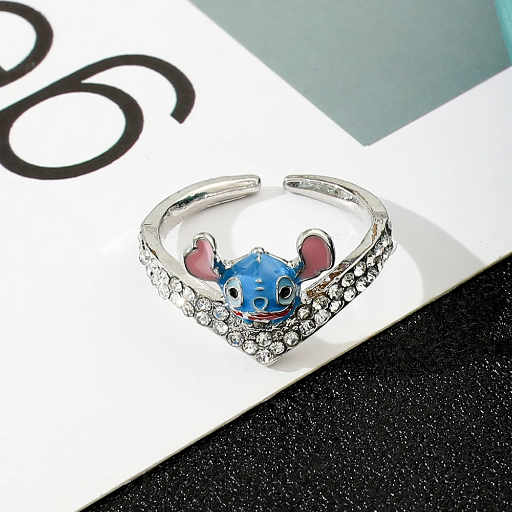 Фото Кольцо на палец из металлического сплава Disney Lilo & Stitch для мужчин, ювелирное изделие с мультяшным цирконом, подарок, аниме-фигурка №1