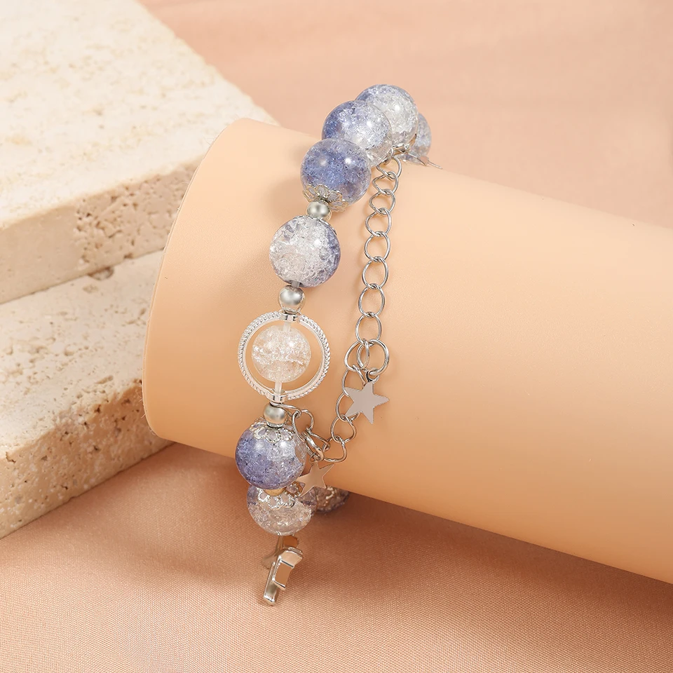 Женский эластичный браслет с бусинами и кристаллами