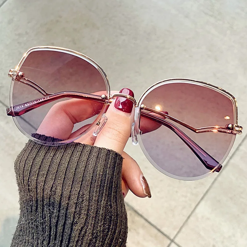 

Очки солнцезащитные женские «кошачий глаз» без оправы с градиентом