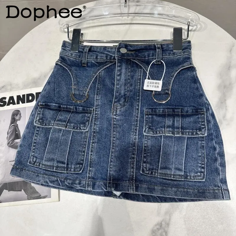 

2023 Spring New Metal Ring Cargo Pocket Design Washed Denim Hip-Wrapped Short Skirt Women A- Line Sheath Jean Mini Skirt Street
