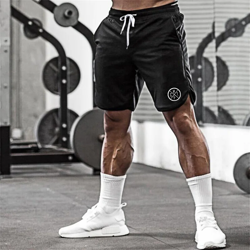 

Brand MCFT ym Sorts Men Bodybuildin Clotin Fitness Mens Mes Sportin Baskeall Workout Joers Sorts Wit Pocket