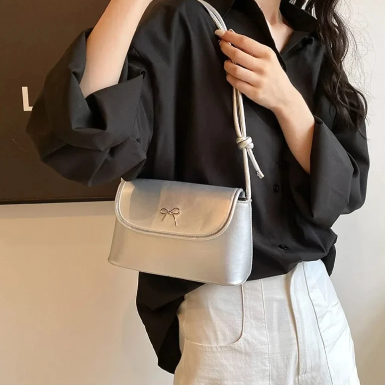 Трендовая дизайнерская сумка для подмышек с бантом однотонная из искусственной