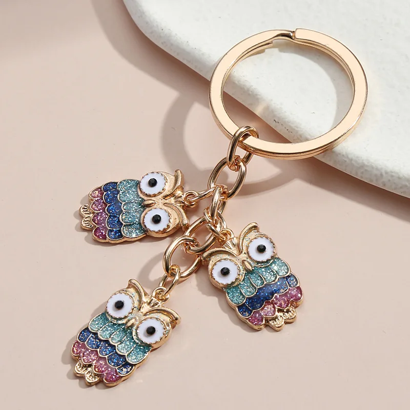 

Hot drop oil alloy color owl ladybug dark face keychain bag ornaments
