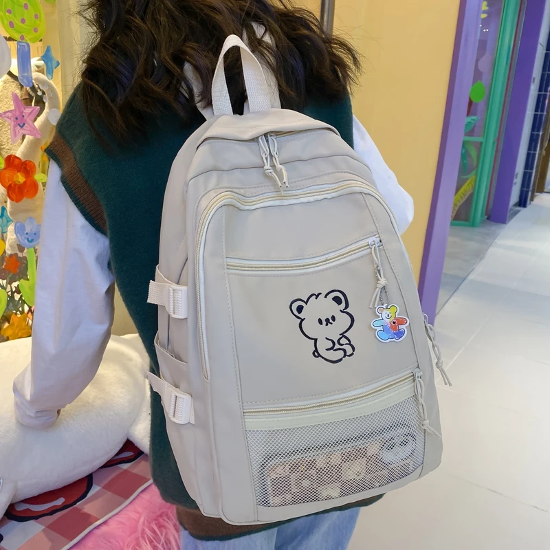 

EST New Casual Waterproof Nylon Large Book Schoolbag Girls School Backpack Women Bag Solid Color Mesh Cartoon Mochila Bolsa Bag
