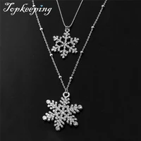 tiny beaded chain pave inlaid snowflake charm double layered long chain necklace