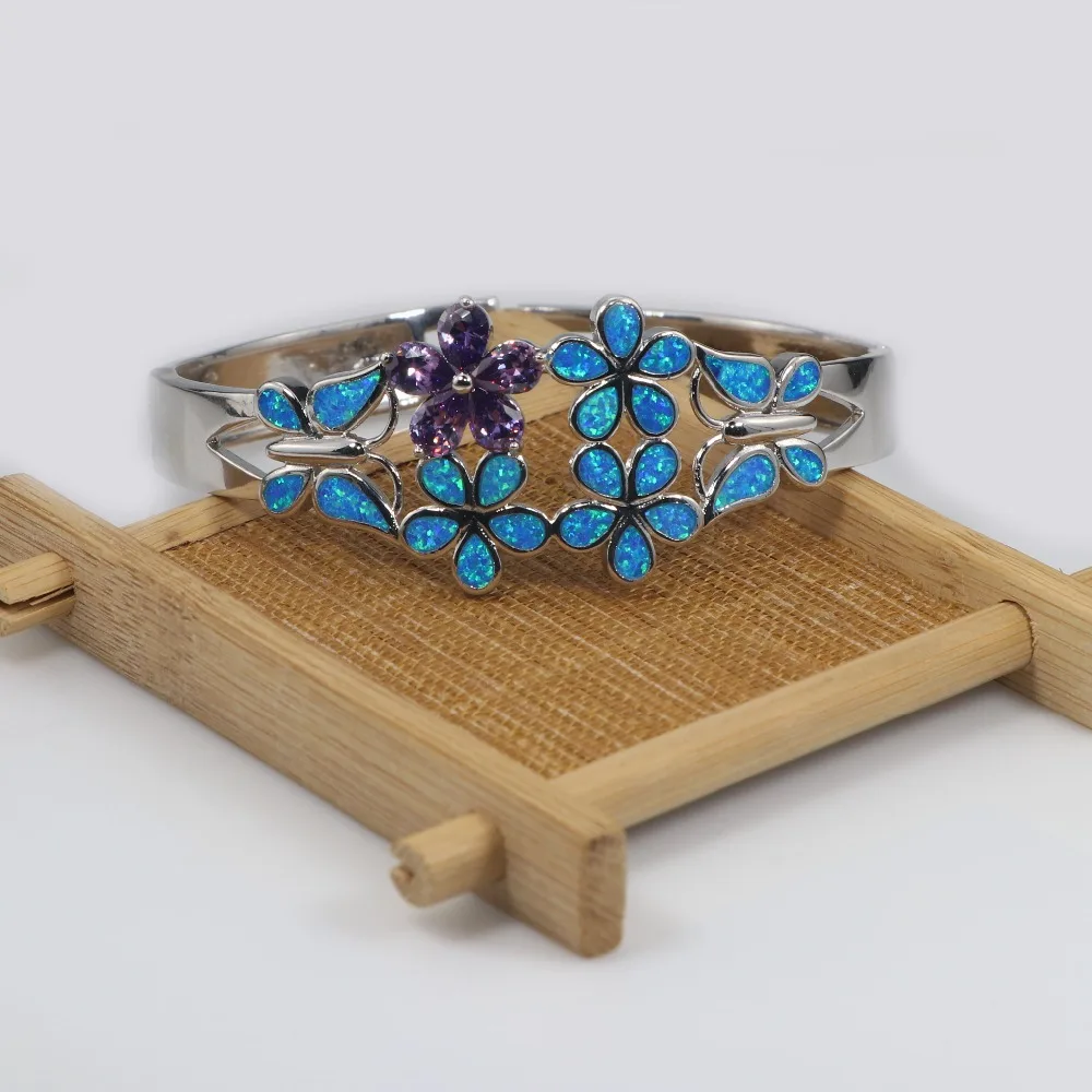 

Женский браслет с разноцветным опалом и фиолетовым Цирконом