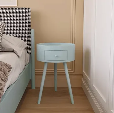 Круглый прикроватный столик с тремя ножками в скандинавском стиле - изображение