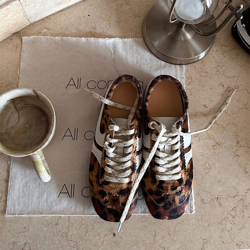 Женские кроссовки из натуральной кожи