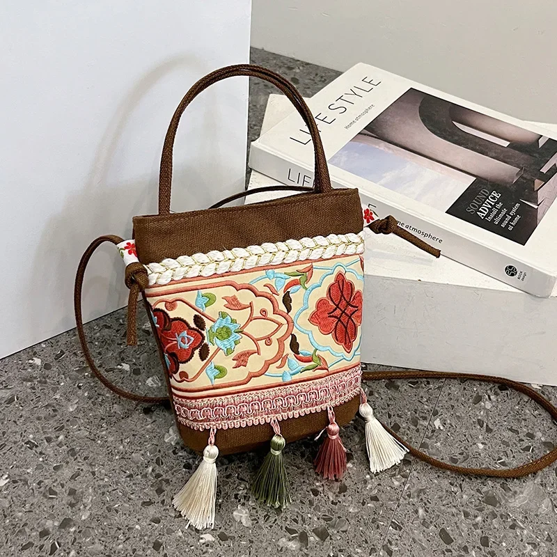 

2023 New Ethnic Style Embroidery Thread Tassel Snap Button Crossbody Bag Holiday Yunnan Fashionable Small Bag Canvas Bag