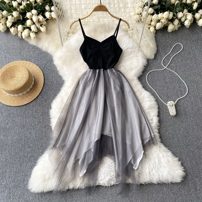 

New Waist-skimming Temperament Irregular Mesh Stitching Hepburn Style Halter Dress