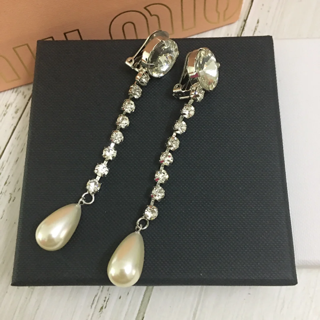 

Temperament niche fashion personality drop bead long tassel ear clip