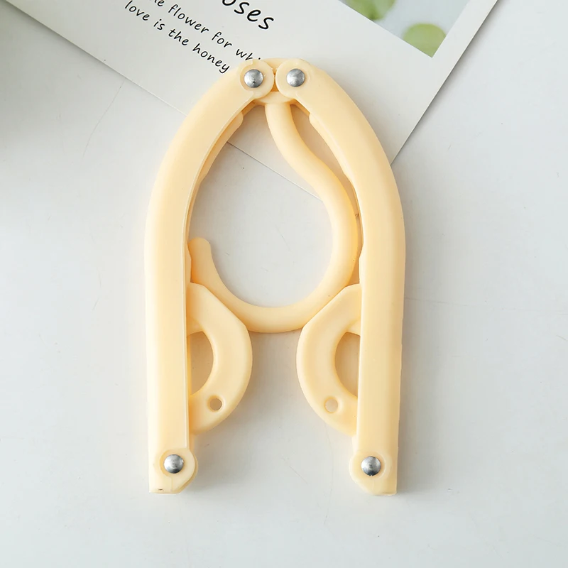 

Пластиковые складные вешалки для одежды