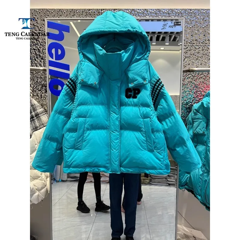 Женский пуховик средней длины свободные трикотажные рукава капюшон с буквой CP