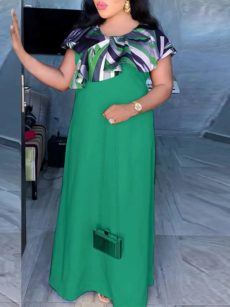 

Платье-макси составного кроя с круглым вырезом и принтом