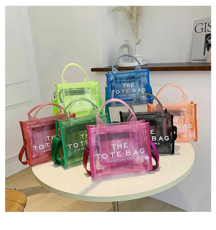 

2022 women's new transparent PVC jelly bag large-capacity hand-held bag beach diagonal bag