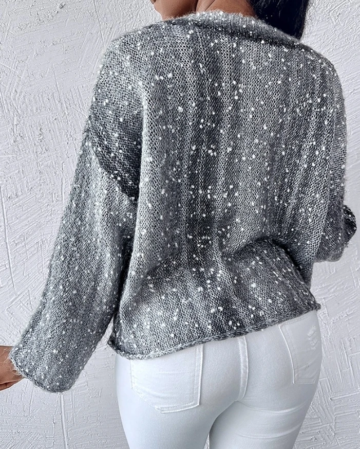 Женский трикотажный свитер с V-образным вырезом и контрастными блестками