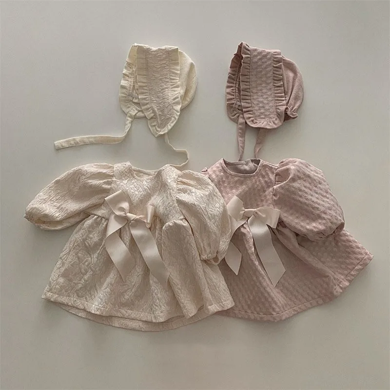 

Детское платье с круглым вырезом, длинным рукавом и бантом