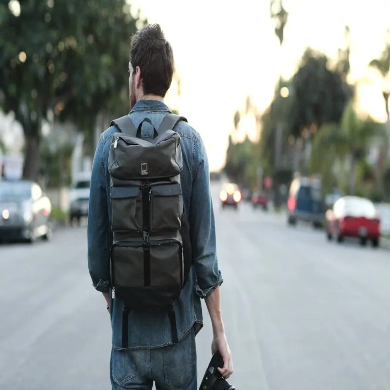 Luxurious Traveler Waterproof Canvas Backpack, High Capacity Hiking Rucksack for Outdoor adventures.