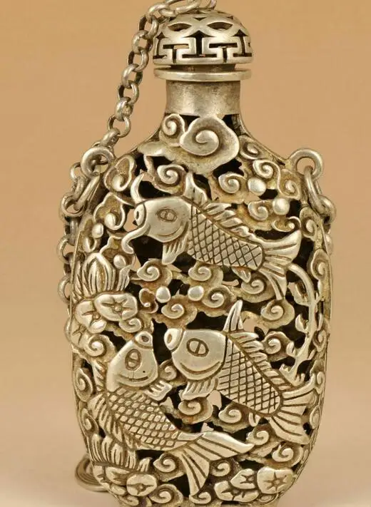 

Old Tibetan silver hand carved ollow out fish lotus Statue Snuff Bottle Pendant