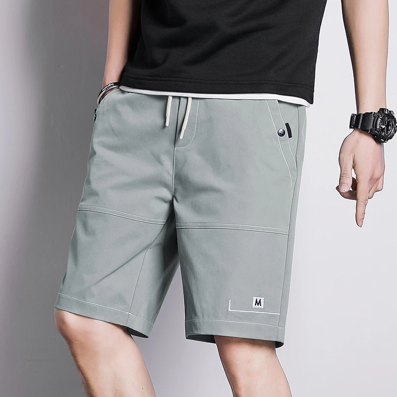 

Casual shorts men's summer explosions loose sports pure cotton pants beach pants 5 minutes five minutes pants tide