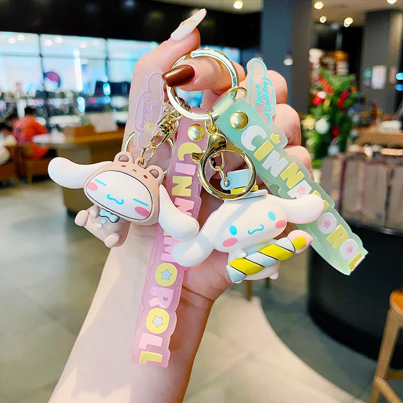 Купи Fashion Creative Kawaii Cinnamoroll Action Figures Toys Keychain Sanrio Anime School Bag Charm Cartoon Key Ring Pendant Kid Gift за 263 рублей в магазине AliExpress
