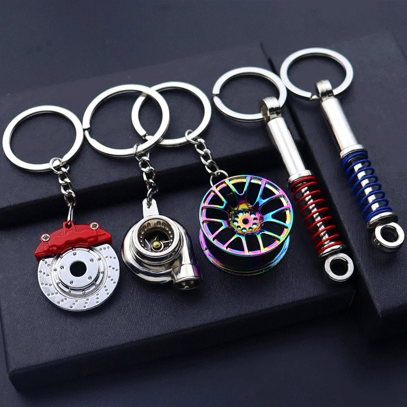 

2023 New Fashion Punk Creative Gift Car Metal Keychain Turbo Gear Hub Pendant Brake Disc Shock Absorber Pendant Friend Gift