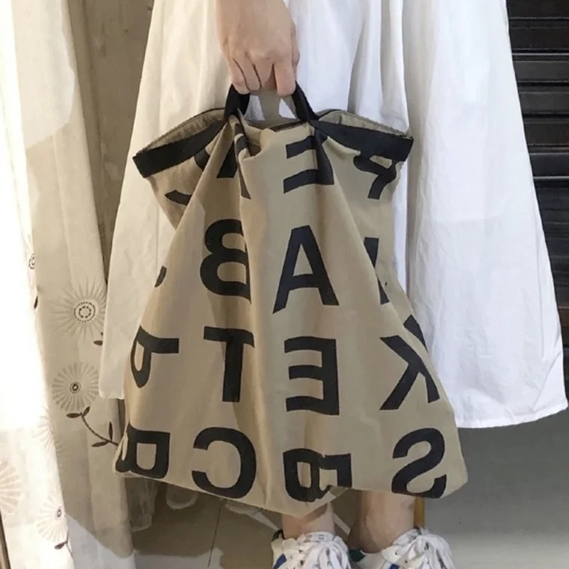 

Женская холщовая вместительная сумка-клатч с надписью и граффити, Дизайнерский Модный Дорожный пляжный кошелек, уникальная сумка для хранения телефона, 2023