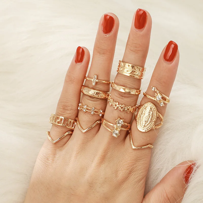 

New 2022 Exaggerated Personality Buddha's One-word Diamond V-word Flower Alloy 13-piece Ring Set